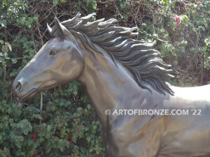 Faster Than Light life-size bronze sculpture of running thoroughbred in full sprint