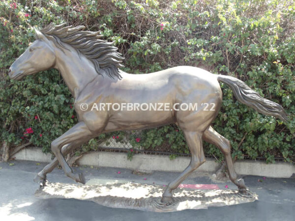 Faster Than Light life-size bronze sculpture of running thoroughbred in full sprint