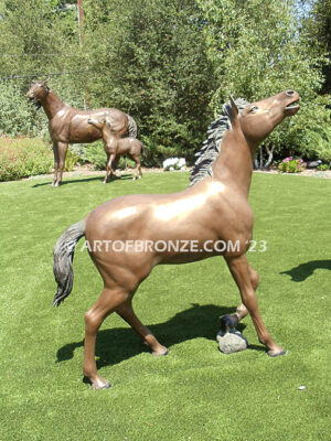 Frolicking colt bronze statue of standing foal horse for ranch or equestrian center