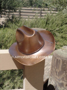 Happy Trails bronze sculpture life-size Stetson cowboy hat