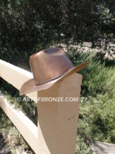 Happy Trails bronze sculpture life-size Stetson cowboy hat