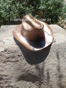 Happy Trails bronze sculpture life-size Stetson cowboy hat