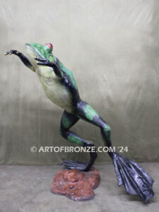 King of the Pond giant leaping frog bronze statue monument with big, webbed toes and eyes