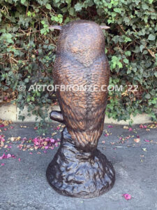 Moonlight Guardian whimsical giant bronze owl statue resting on branch