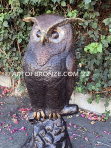 Moonlight Guardian whimsical giant bronze owl statue resting on branch