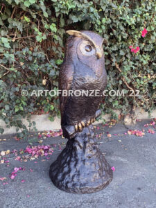 Moonlight Guardian whimsical giant bronze owl statue resting on branch