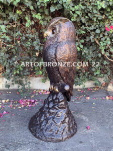 Moonlight Guardian whimsical giant bronze owl statue resting on branch