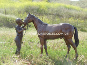 My Love outdoor bronze statue of young equestrian girl petting her pony horse