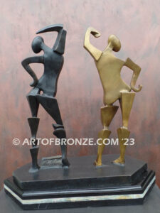 Night and Day Salvador Dali inspired bronze statue of two figures with watches/clocks on their chest
