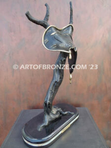 Persistence of Memory Salvador Dali inspired bronze statue of melting watches and clocks