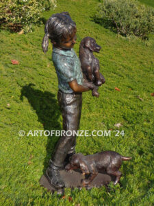 Play with me too charming bronze statue of girl playing with puppy dogs