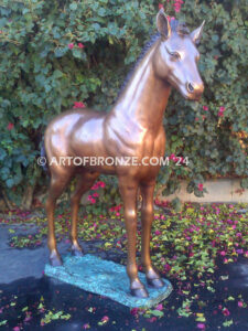 Precious bronze sculpture of standing foal, filly, colt and yearling horse for ranch or equestrian center