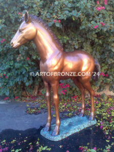 Precious bronze sculpture of standing foal, filly, colt and yearling horse for ranch or equestrian center