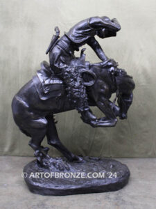 Rattlesnake bronze statue cowboy on bucking horse after Frederic Remington