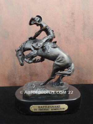 Rattlesnake bronze statue cowboy on bucking horse after Frederic Remington