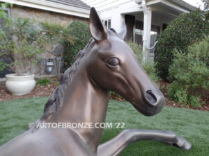 Spring Blessing bronze sculpture of resting foal, filly, colt and yearling horse for ranch or equestrian center