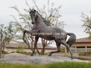 Striking Freedom bronze monument statue of assertive stallion horse for Griffin Ranch in La Quinta, CA