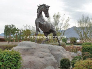 Striking Freedom bronze monument statue of assertive stallion horse for Griffin Ranch in La Quinta, CA