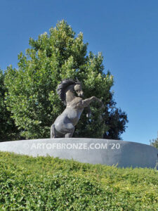 Wild Country sculpture of reared horse with forelegs off the ground and hind legs attached bronze base