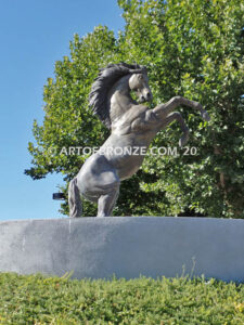 Wild Country sculpture of reared horse with forelegs off the ground and hind legs attached bronze base