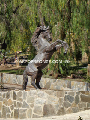 Wild Country sculpture of reared horse with forelegs off the ground and hind legs attached bronze base