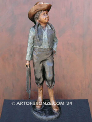 Wild West Spirit bronze statue standing cowgirl holding rope dressed in western attire