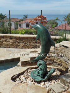 Above the Splash marine art bronze leaping dolphin statue monument