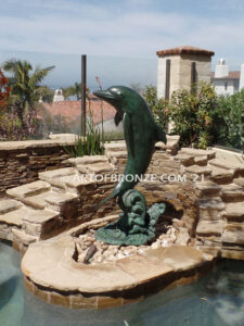 Above the Splash marine art bronze leaping dolphin statue monument