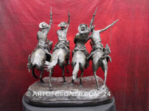 Coming Thru the Rye bronze statue after Frederic Remington featuring four horseman on galloping horses