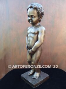 Manneken Pis 17th century bronze sculpture of naked little boy peeing into fountain