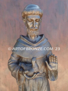 Saint Francis holding dove and giving blessing bronze statue