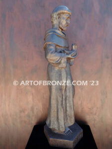 Saint Francis holding dove and giving blessing bronze statue