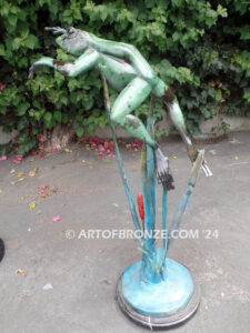 Swimming Lessons bronze sculptures of playful and whimsical frogs for outdoor and garden display