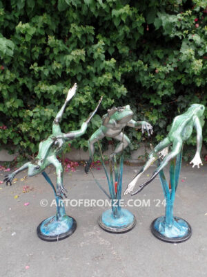 Swimming Lessons bronze sculptures of playful and whimsical frogs for outdoor and garden display
