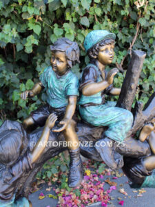 Branch of Joy monumental bronze sculpture four children playing on branch