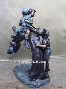 Branch of Joy monumental bronze sculpture four children playing on branch