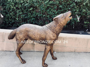 Echoes in the Night life-size standing coyote howling at the moon bronze sculpture