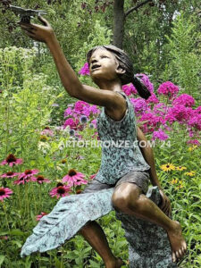 McCrory Garden outdoor bronze statue butterfly girl sitting on leaf