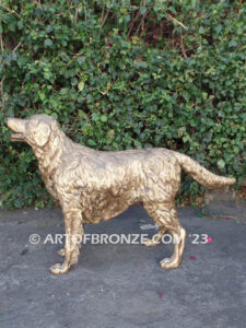 Faithful gallery quality bronze sculpture of standing golden retriever dog monument