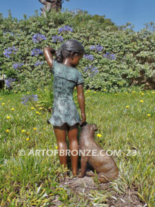 Girls Best Friend bronze sculpture of girl playing with puppy