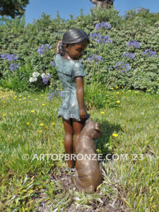 Girls Best Friend bronze sculpture of girl playing with puppy