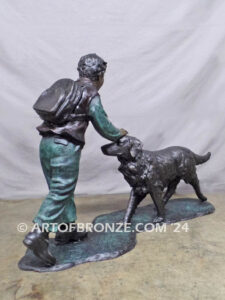 Homeward Bound outdoor garden bronze sculpture of young boy petting his dog