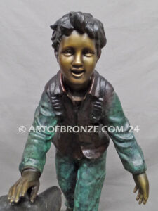 Homeward Bound outdoor garden bronze sculpture of young boy petting his dog