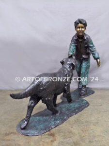 Homeward Bound outdoor garden bronze sculpture of young boy petting his dog