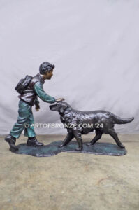 Homeward Bound outdoor garden bronze sculpture of young boy petting his dog