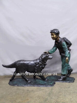 Homeward Bound outdoor garden bronze sculpture of young boy petting his dog