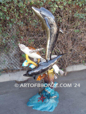 Ocean Harmony custom bronze artwork of leaping dolphin and calf sculpture