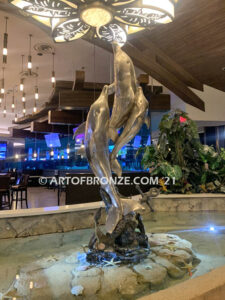 Oceans Joy bronze fine art gallery fountain of three ascending dolphins