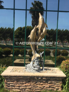 Oceans Joy bronze fine art gallery fountain of three ascending dolphins