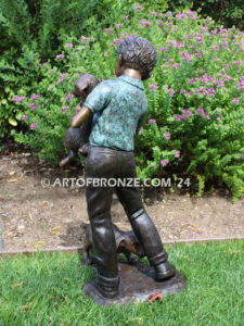 Play with me charming bronze statue of boy playing with puppy dogs